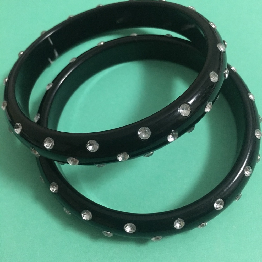 Set of 2 plastic bangle bracelets—all